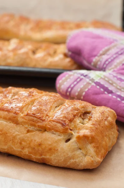 Strudel cakes on baking pan — Stock Photo, Image