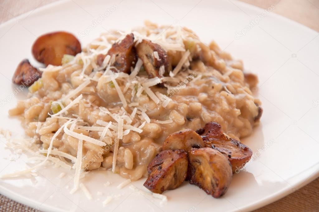 Delicious mushroom risotto served with cheese