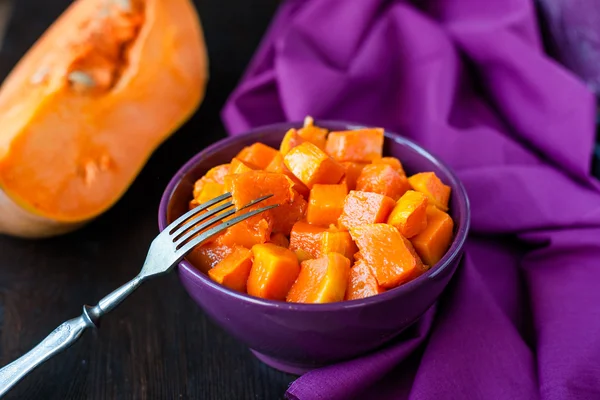 Pumpkin cream-soup with seeds in a plate — Stock Photo, Image