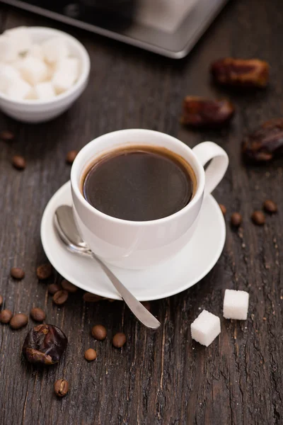 Braekfast in the morning, cup of black coffee, on the wooden tab — Stock Photo, Image