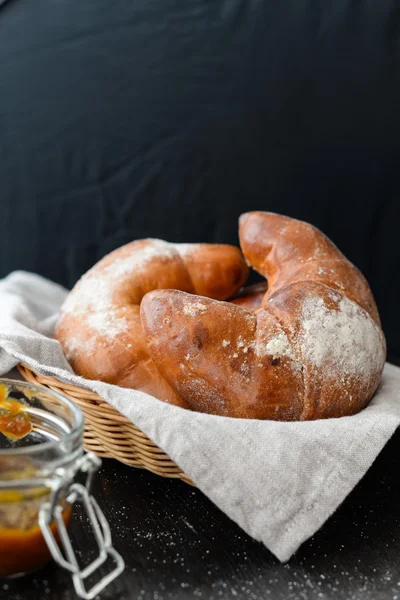 Delicious breakfast with fresh croissants and jam — Stock Photo, Image