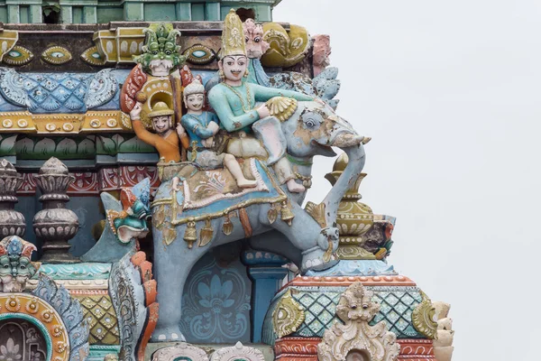 Corner of Gopuram featuring three men on elephant. — Stock Photo, Image