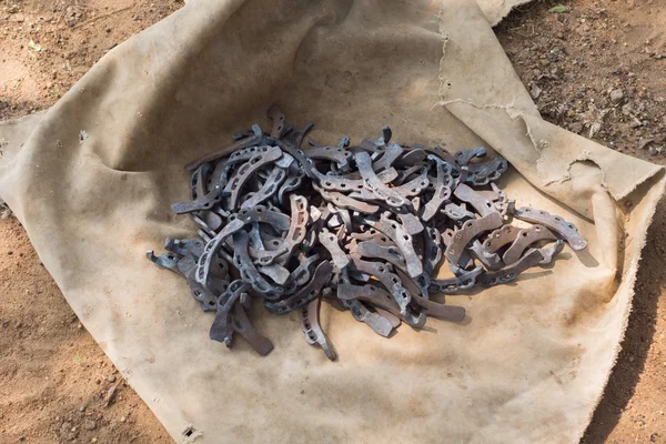 Buffalo shoes on a tarp near Namunasamudran. — Stock Photo, Image