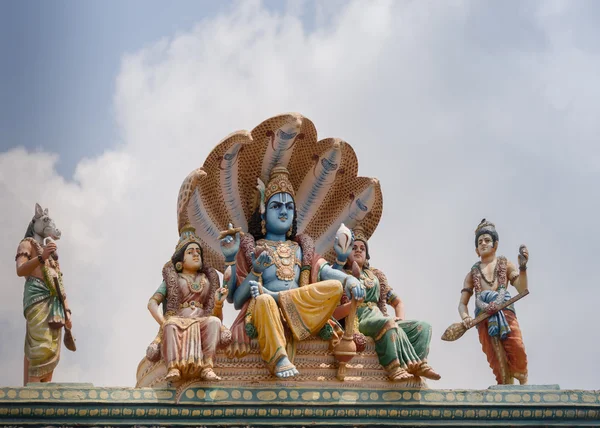 Vishnu, Lakshmi and Bhu under Shesha cobra. — Stock Photo, Image