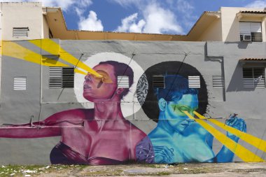 Graffiti of pink woman and blue woman beaming light. clipart
