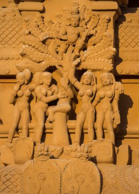 Krishna flees angry, naked women statue.