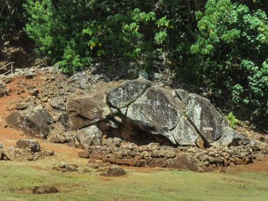 Kapaa, Kauai, Hawaii, USA - July 17, 2025: Holoholoku Heiau prehistoric holy religious ruin and field. Pohakuho Ohanau (Royal Birthstones) sacred rocky niche