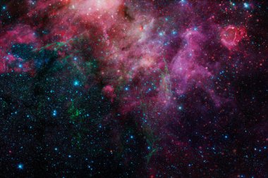 Uzayda bir yerlerde muhteşem bir galaksi. Kozmik duvar kağıdı. Bu görüntünün elementleri NASA tarafından desteklenmektedir