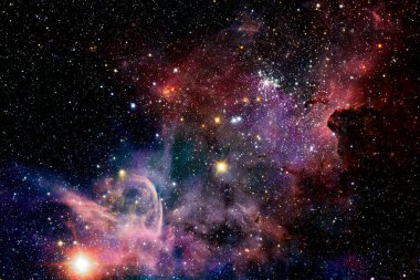 Uzayda bir yerlerde muhteşem bir galaksi. Kozmik duvar kağıdı. Bu görüntünün elementleri NASA tarafından desteklenmektedir