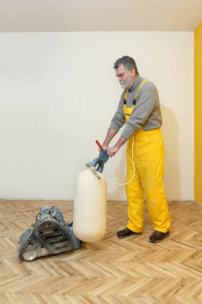 Home renovation, parquet sanding — Stock Image Home renovation, parquet sanding Royalty Free Stock Photos