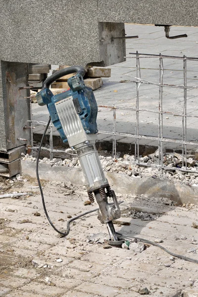 Construction site, demolishing with electric plugger — Stock Photo, Image