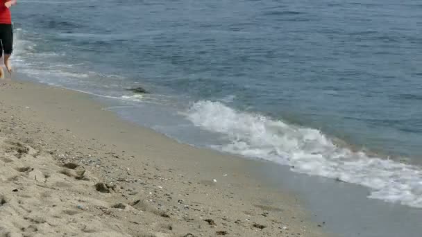 Girl running at beach — Stock Video