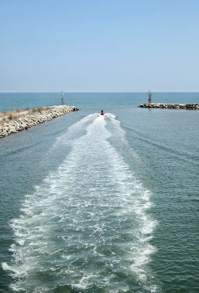 Sea scooter leaving port — Stock Photo, Image