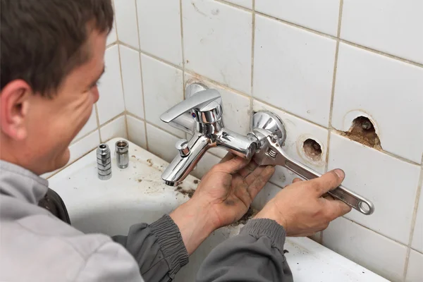 Plumber at work Stock Picture