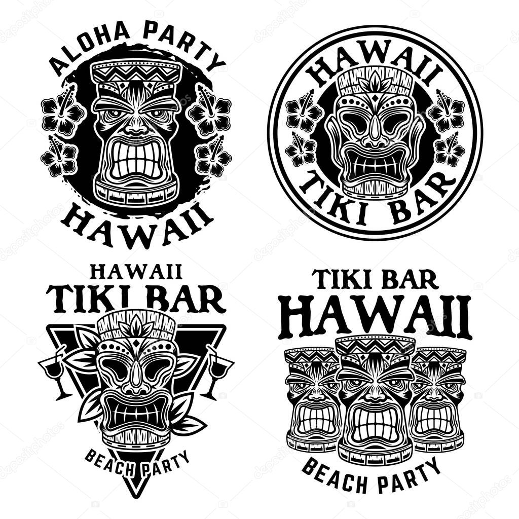 Hawaiian tiki wooden head set of four vector monochrome emblems, badges, labels, stickers or logos in vintage style isolated on white
