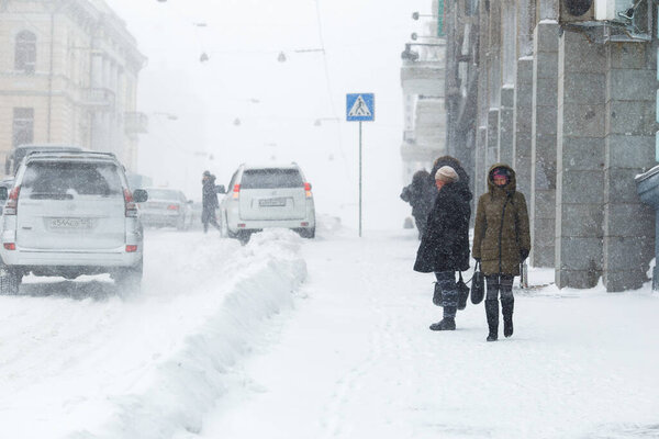 January, 2016 - Vladivostok, Russia - Heavy snowfall in Vladivostok. Snow-covered central streets of Vladivostok during heavy snowfall