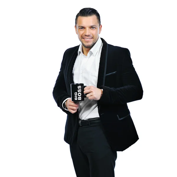 Portrait of a young man holding cup isolated on white background — Stock Photo, Image