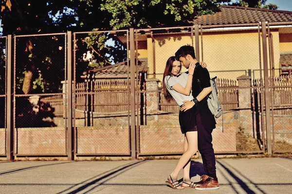 Young couple hugging and kissing outdoor — Stock Photo, Image