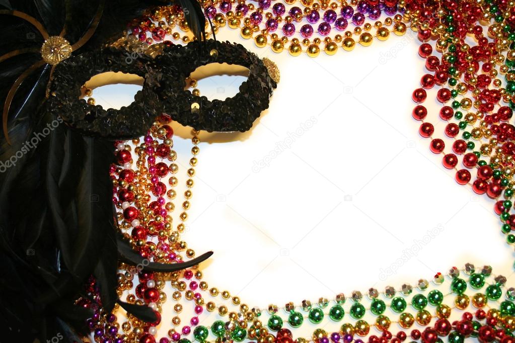 Mardi Gras Beads and Mask Stationary / Background