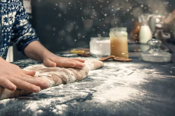 Close up of child hands making Christmas cookies and rolling ginger dough. Christmas and New Year holidays — Stock Photo, Image