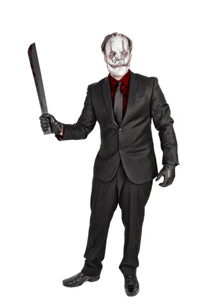 Maskerad mördare i elegant kostym — Stockfoto