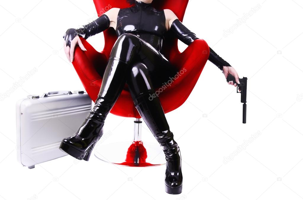 Sexy woman sitting on chair.