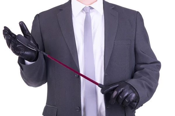 Biznesmen posiadania szpicrutą. — Zdjęcie stockowe
