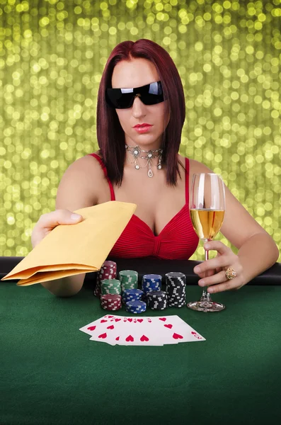 Woman playing poker — Stock Photo, Image