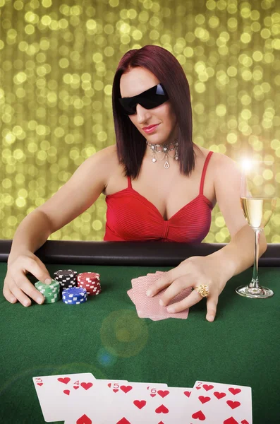 Woman playing poker — Stock Photo, Image