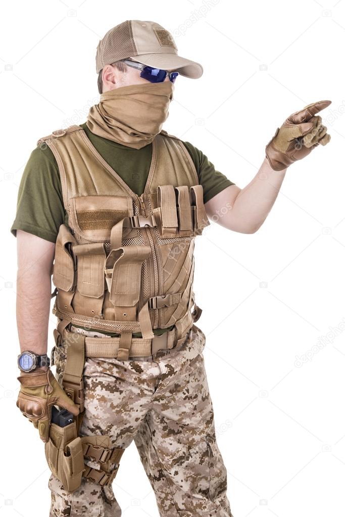 Soldier man holding his gun.