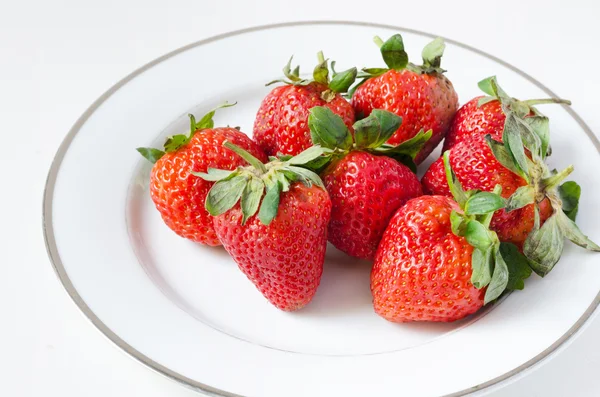 Ripe strawberries in a plate — Stock Photo, Image