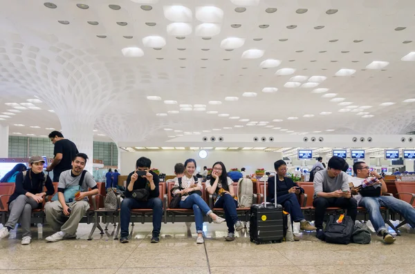 Mumbai, India - January 5, 2015: Tourist at Chhatrapati Shivaji International Airport.