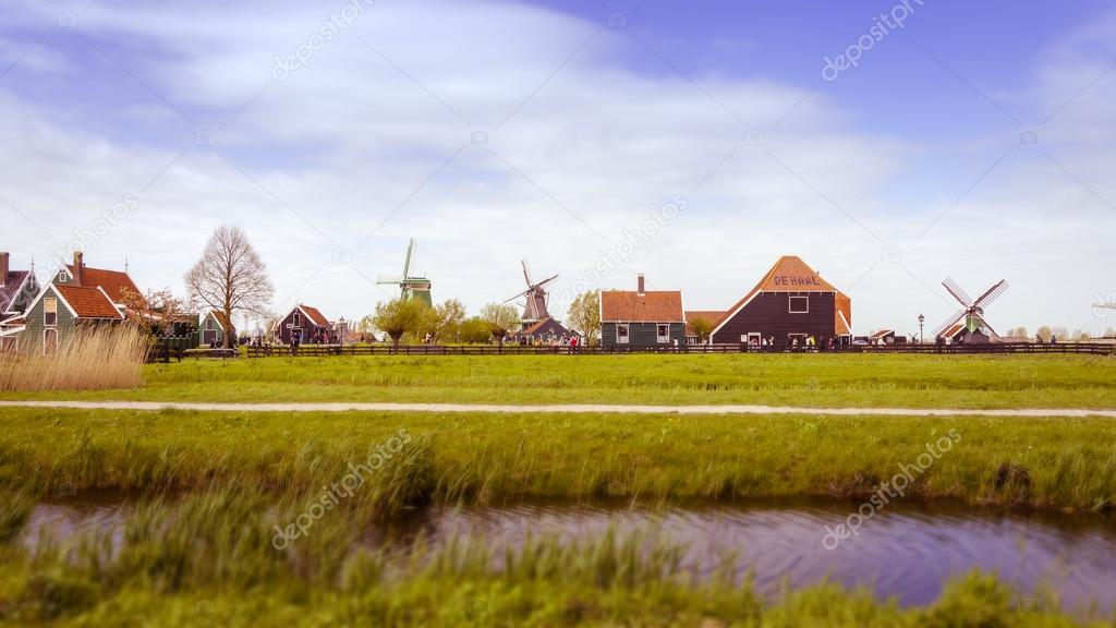 Windmills and rural houses in Zaanse Schans. Tilt-shift effect 