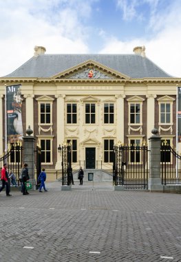 The Hague, Netherlands - May 8, 2015: Tourists visit Mauritshuis Museum in The Hague