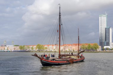 Rotterdam, Netherlands - May 9, 2015: Tourist boat on Nieuwe Maas (New Meuse) river in Rotterdam