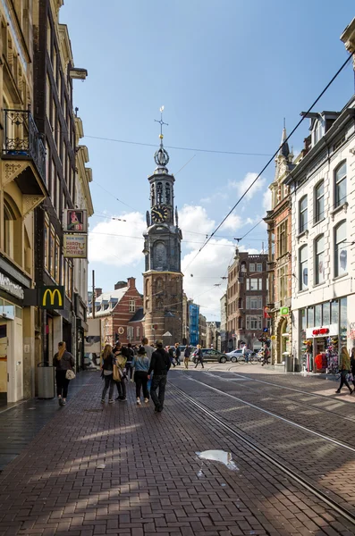 Amsterdam, Netherlands - May 8, 2015: People at The Munttoren (Mint Tower) Muntplein square in Amsterdam — Stock Photo, Image