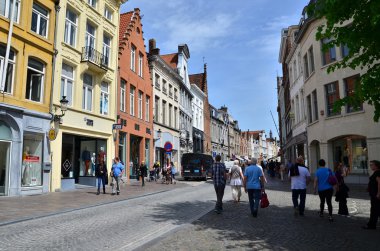 Bruges, Belgium - May 11, 2015: Tourists visit Steenstraat Shopping Street in Bruges, Belgium.