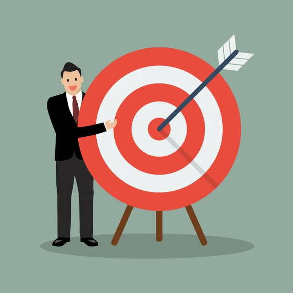 Businessman pointing to the big target — Stock Vector