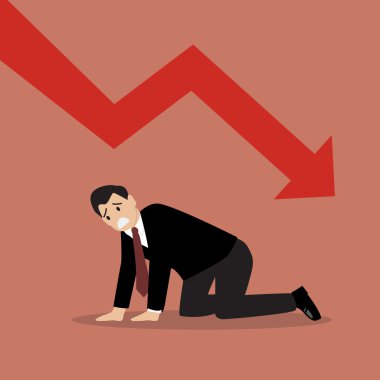 Desperate businessman with graph down