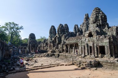 Siem Reap, Cambodia - December 3, 2015: Tourists at Bayon temple