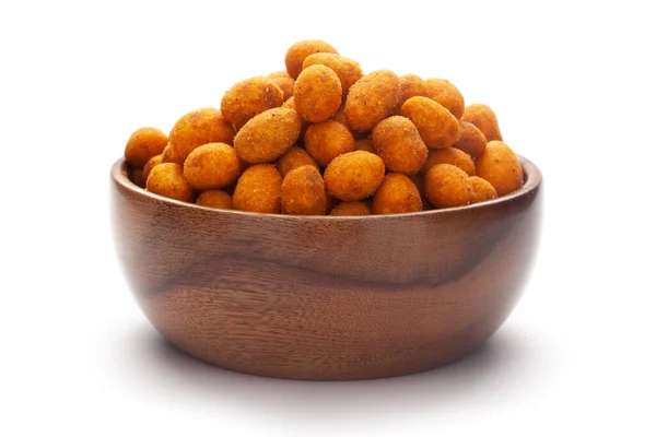 El yapımı (el yapımı) ahşap kâse, besan kaplı fıstıkla yapılır. Hint baharatlı atıştırmalıkları (Namkeen),