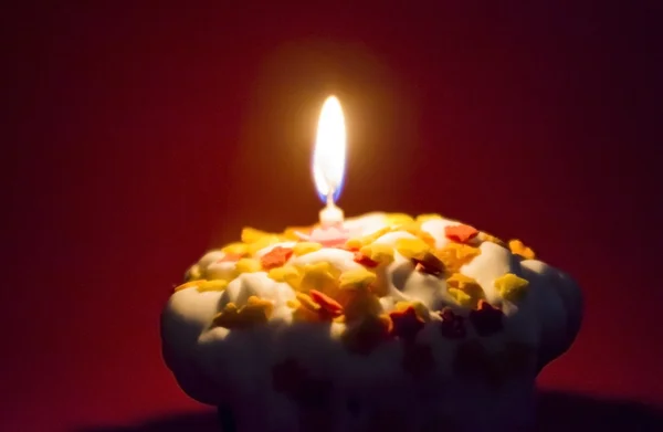 Fiesta de magdalenas con una vela —  Fotos de Stock