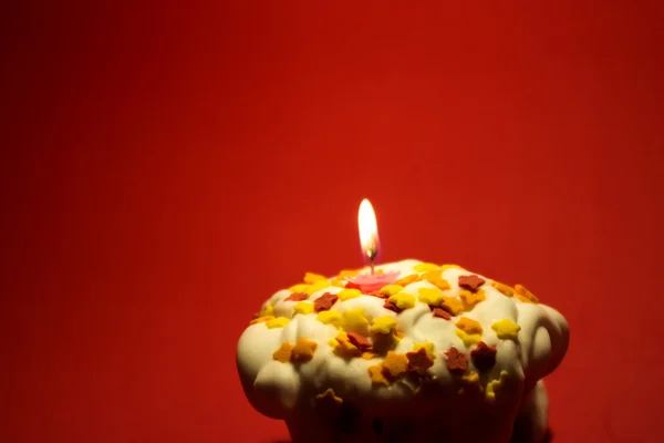 Кексовая вечеринка со свечой — стоковое фото