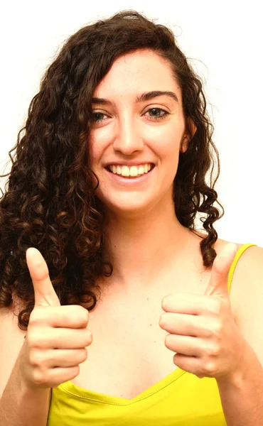 Krása ženy s palcem nahoru znamení optimismu nad bílé pozadí — Stock fotografie