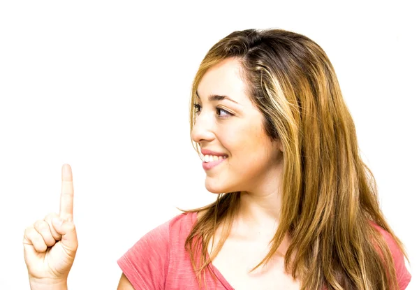 Portrait of a beautiful woman pointing up with her finger — Stock Photo, Image