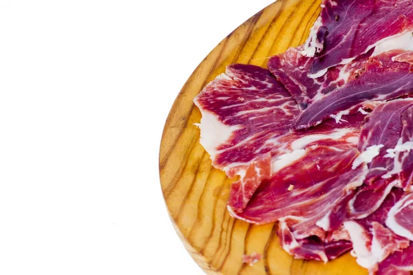 Typické Španělské Chutné Porce Šunky Dřevěném Podnosu Bílém Pozadí — Stock fotografie
