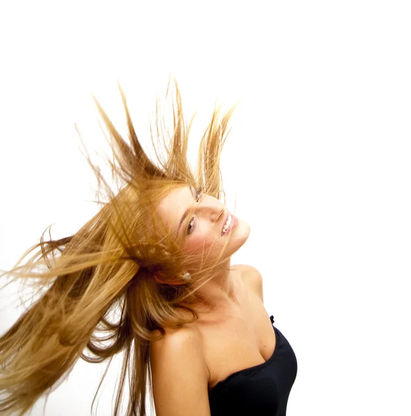 Mulher loira bonita tremendo seu cabelo — Fotografia de Stock