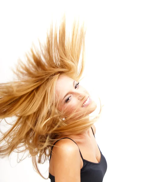 Güzel sarışın kadın saçını sallama — Stok fotoğraf