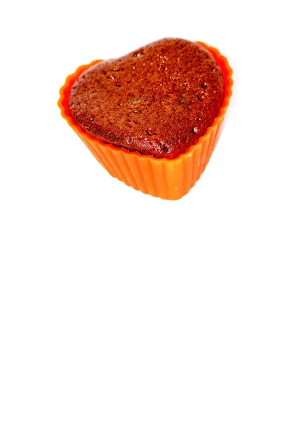 Chocolate muffins in silicone holders with form of heart — Stock Photo, Image