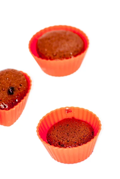 Chocolate muffins in silicone holders with form of heart — Stock Photo, Image